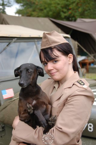 usfemaleofficerwithmascot.jpg