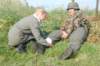 awoundedgermansoldierhelpedbyanurse_small.jpg