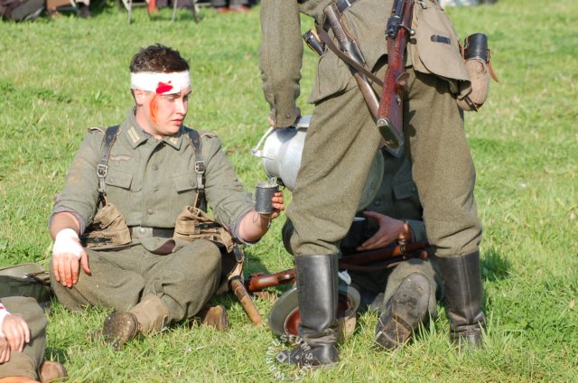 germanwoundedsoldierdrinking.jpg