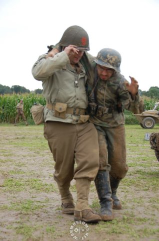 ussoldierhelpingawoundedgermansoldier.jpg