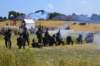 sharpshootersinfrontofthefarmholdfirminbritishhands_small.jpg